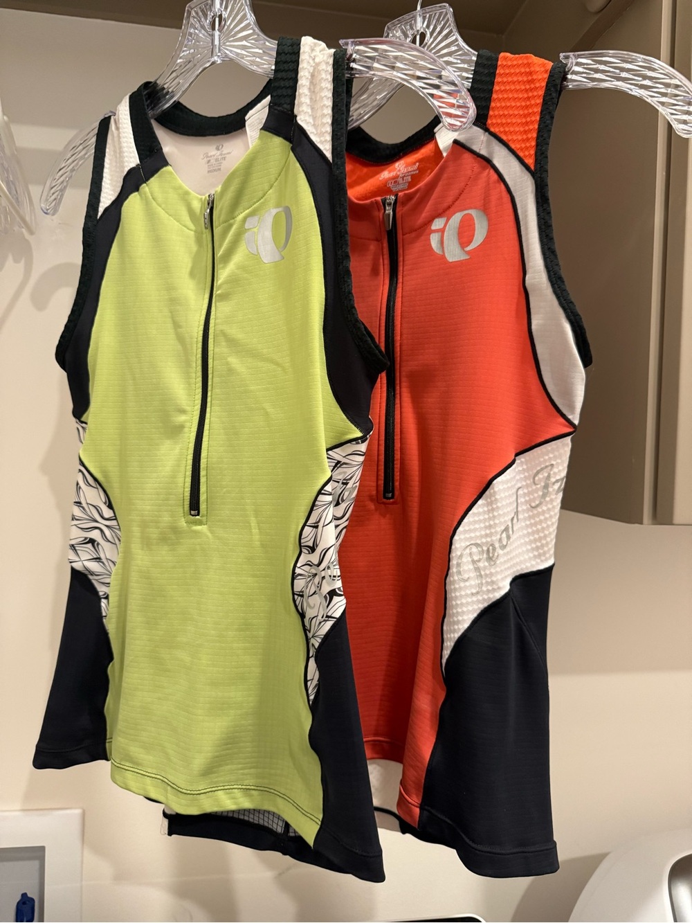 Pearl Izumi Women's Sleeveless Cycling Tops in Lime and Coral - Elite